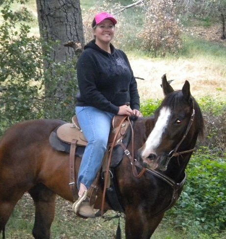 Lieutenant Christy Hamrick on horseback.