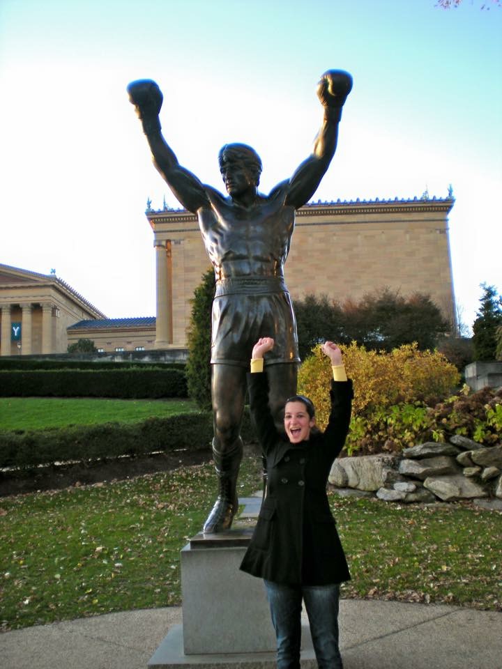 Laura Moore with Rocky statue in the background.
